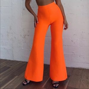 Neon orange flare pants